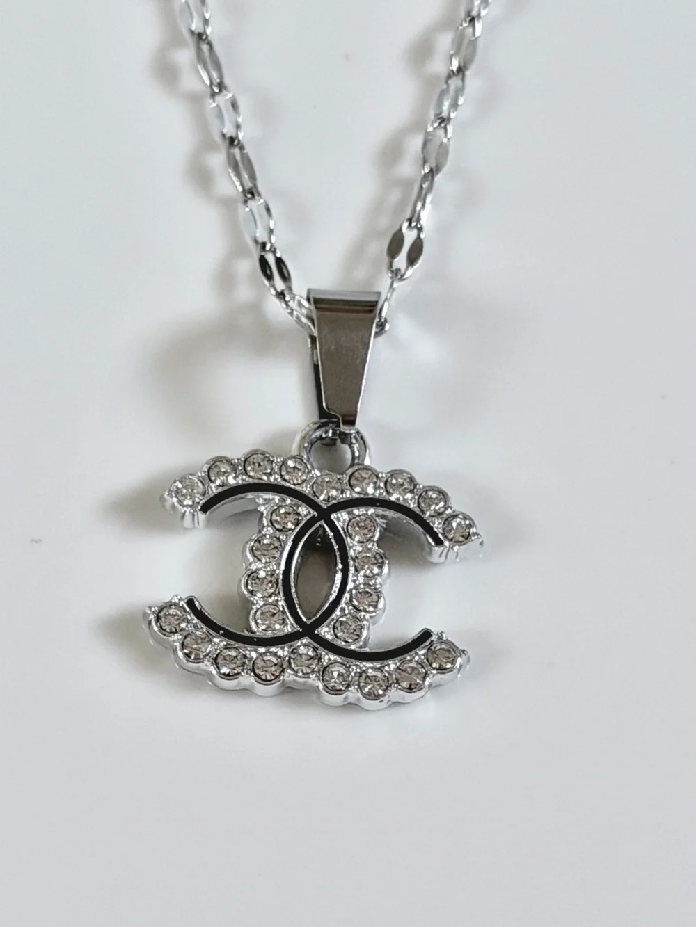 Crystal-Embellished Interlocking Logo Pendant Necklace in Silver